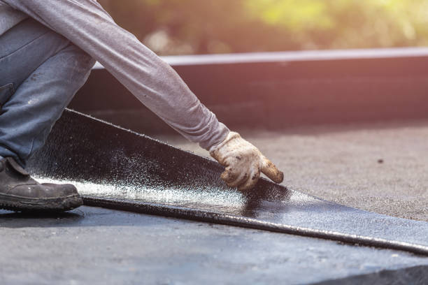 Professional Basement Waterproofing technician working in Hempstead, NY